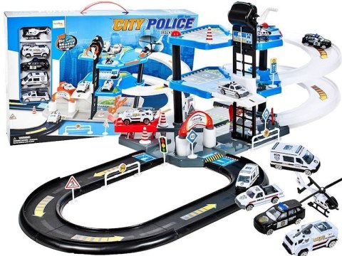 Parking policyjny z autami i helikopterem